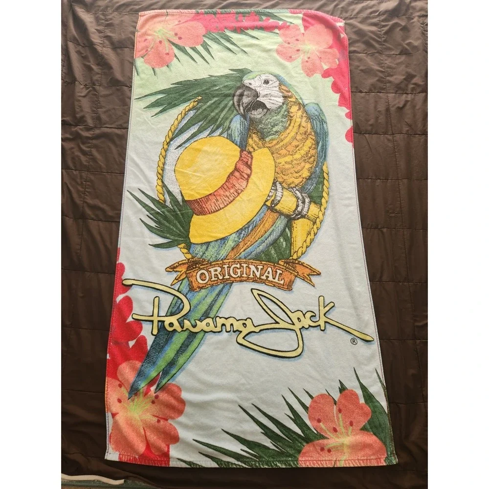 Vintage Panama Jack beach towel featuring a parrot and a straw hat 60 x 31